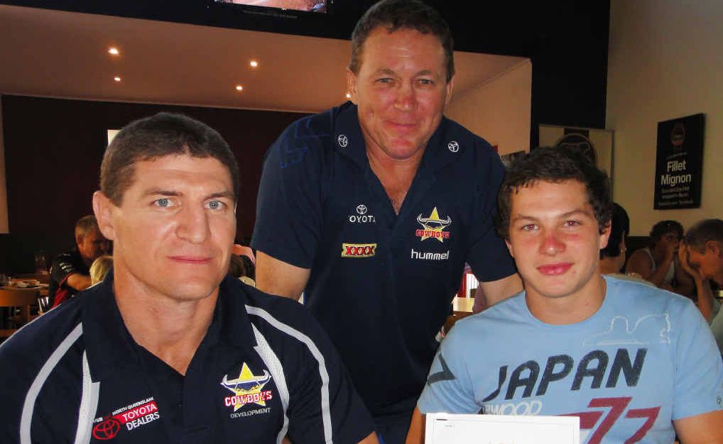 NQ Toyota Cowboys football operation manager Peter Jones, NQ Toyota Cowboys recruitment manager Adrian Thomson with Brady Williams, signing his NQ Cowboys contract. NQ Toyota Cowboys football operation manager Peter Jones, NQ Toyota Cowboys recruitment manager Adrian Thomson with Brady Williams, signing his NQ Cowboys contract.